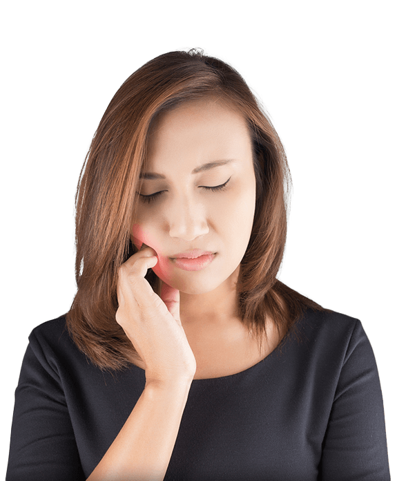 Woman in pain holding side of cheek before root canal therapy