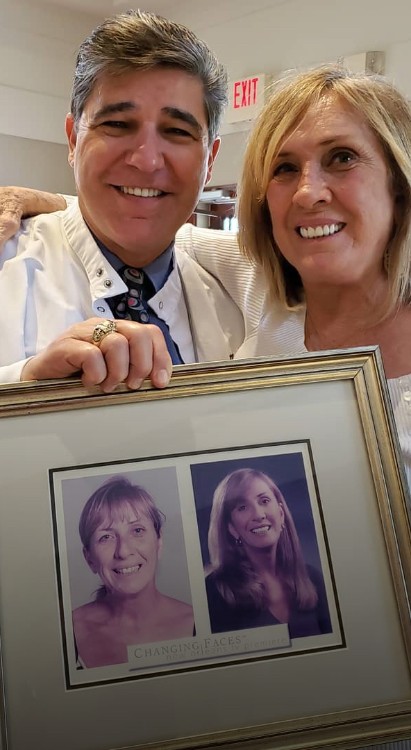 Covington dentist holding before and after photos of dental patient