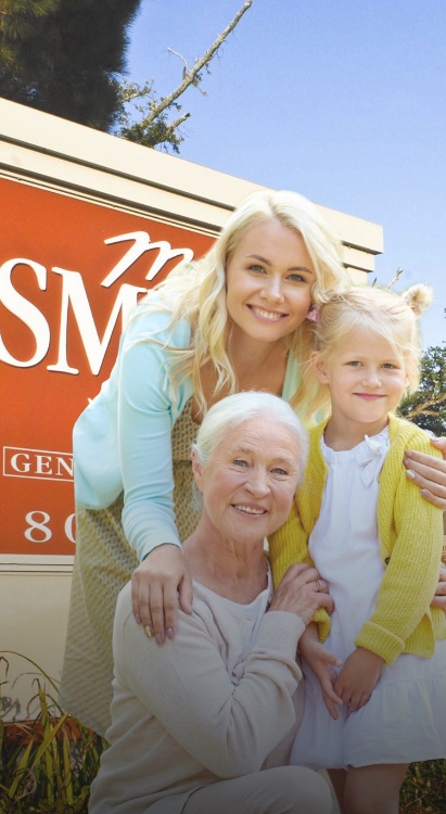 Three generations of women standing in front of MoreSmiles Dental