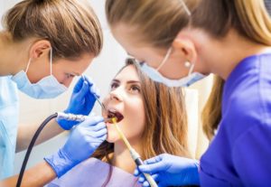 A girl having her teeth's check up